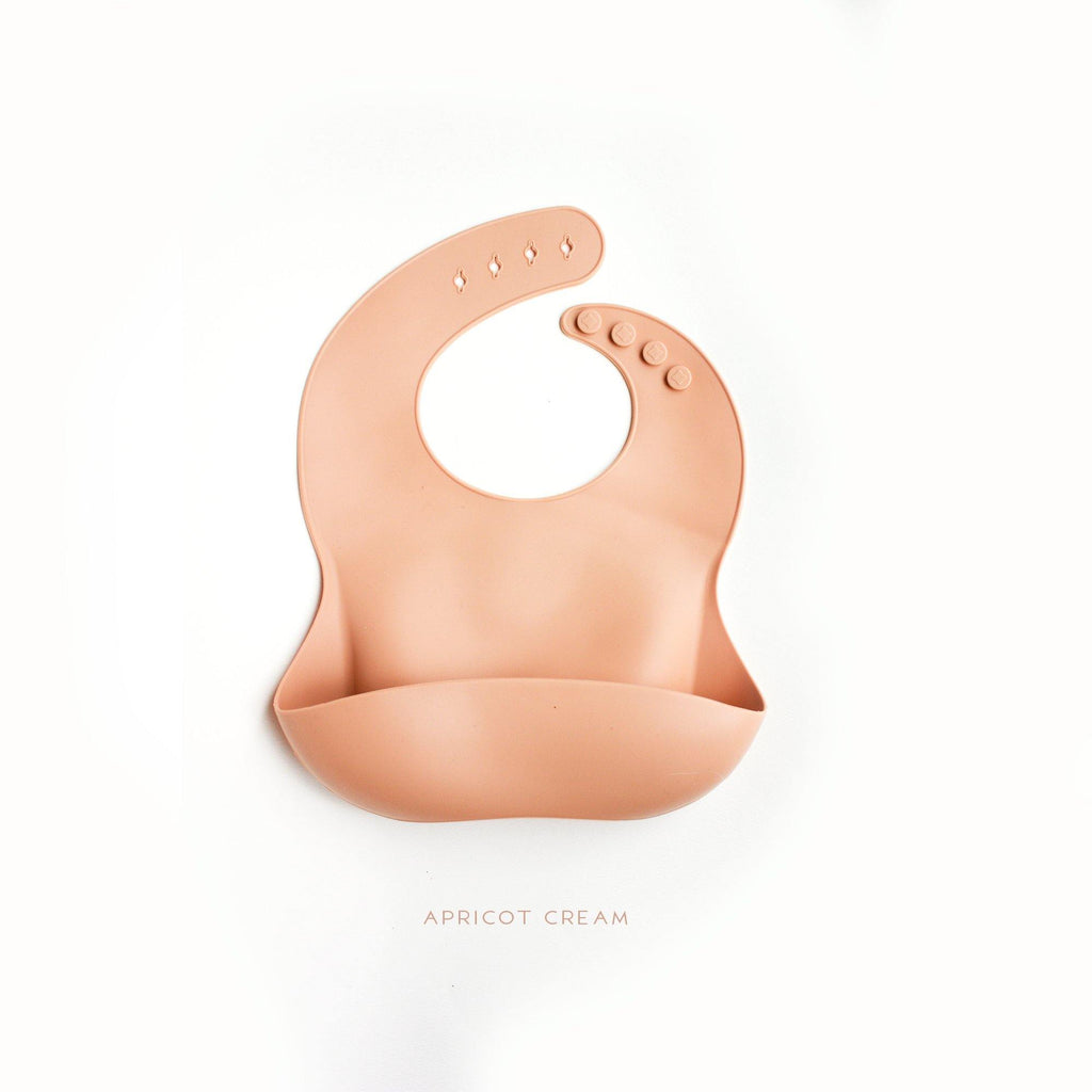 Silicone Feeding Bib in Apricot Cream - Our Story Paper Co.