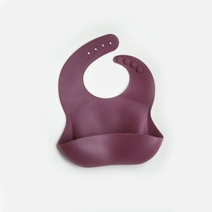 Silicone Feeding Bib in Raspberry Mauve - Our Story Paper Co.